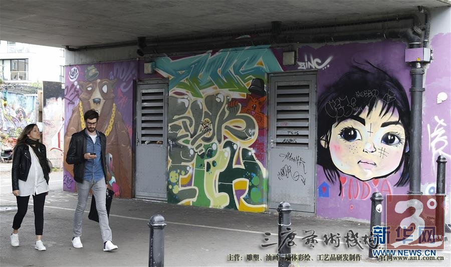 随处可见的涂鸦作品吸引了大量游客