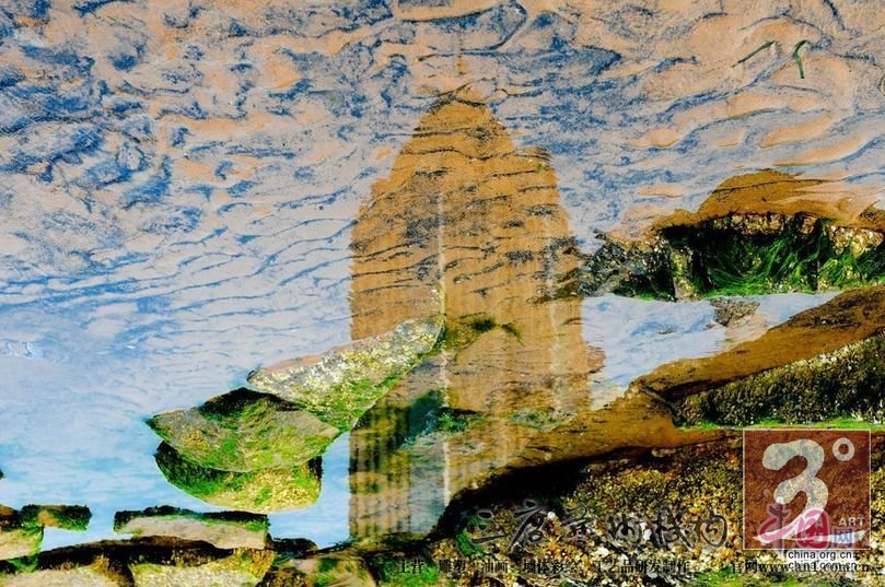 青岛:如梦如幻的沙滩城市倒影似油画（高清组图）