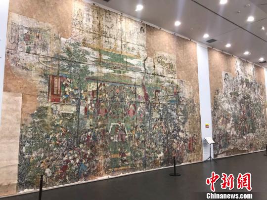 在太原美术馆9号展厅，展览展线长100余米，其中包含稷山青龙寺金代壁画，芮城永乐宫元代壁画、新绛稷益庙明代壁画等多处寺观壁画的1:1摄影图。　王惠琳 摄